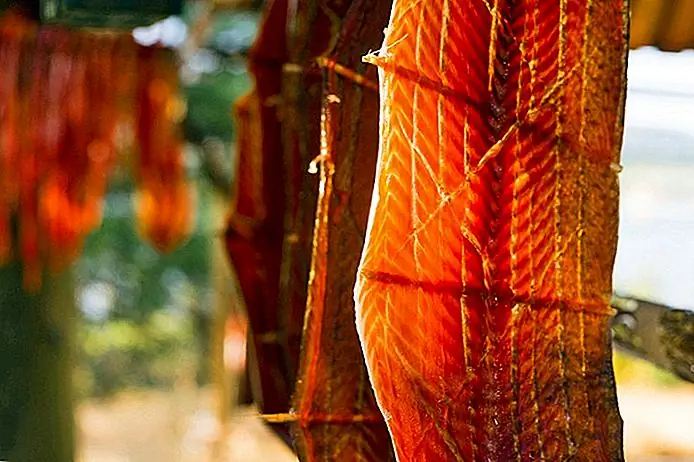 Salmon meat cut and hung to dry